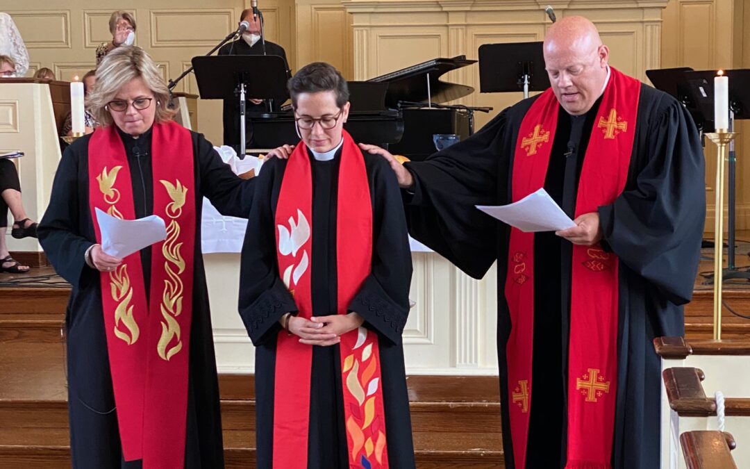 Installation of The Rev. Lindsey Altvater Clifton, pictured (center)